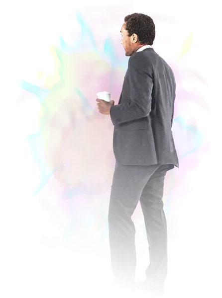 Man in suite with coffee looking away